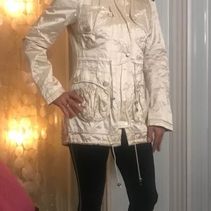 Creme rain jacket , like new
